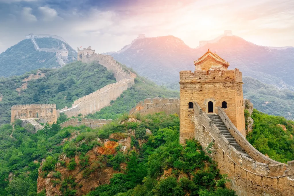 The Great Wall of China, an amazing Asian place to travel, stretching across mountainous terrain under a clear sky