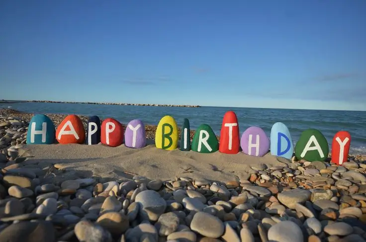 "birthday trip ideas cake on the beach"