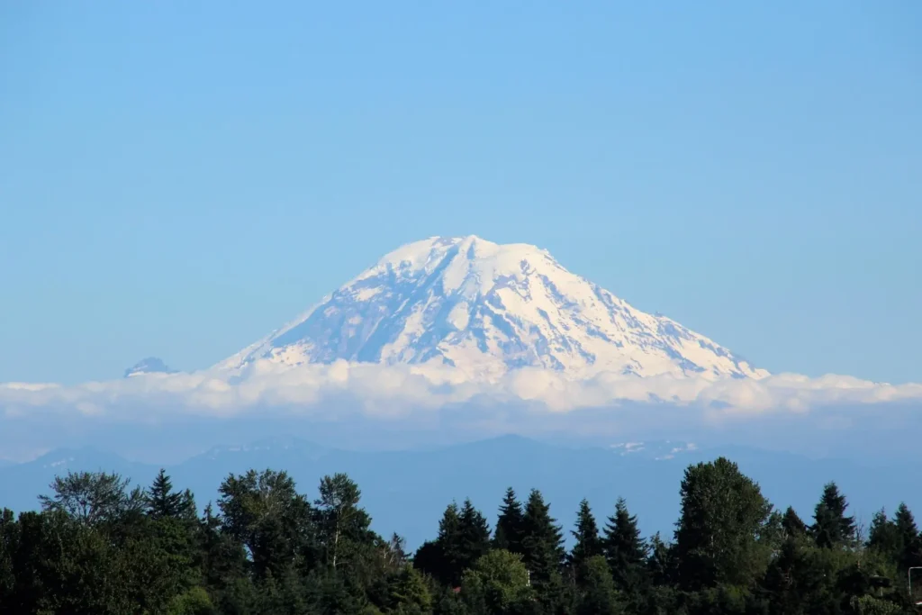 "Mount Rainier at sunrise, exemplifying the natural splendor of one of the most beautiful cities in the US."