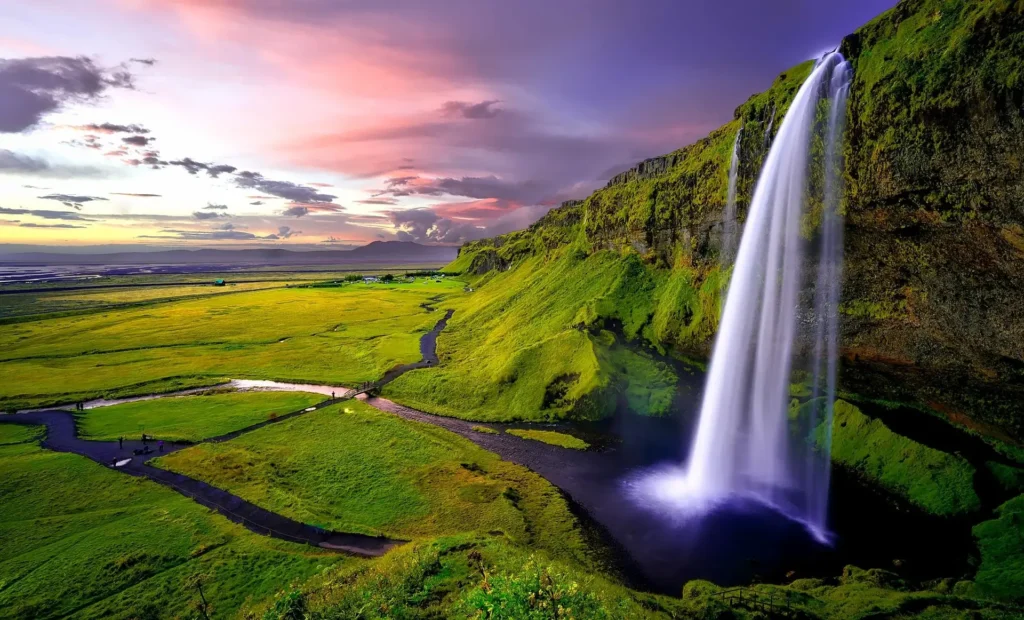 Best time to travel to Iceland to visit Seljalandsfoss Waterfall, a stunning Icelandic natural wonder,