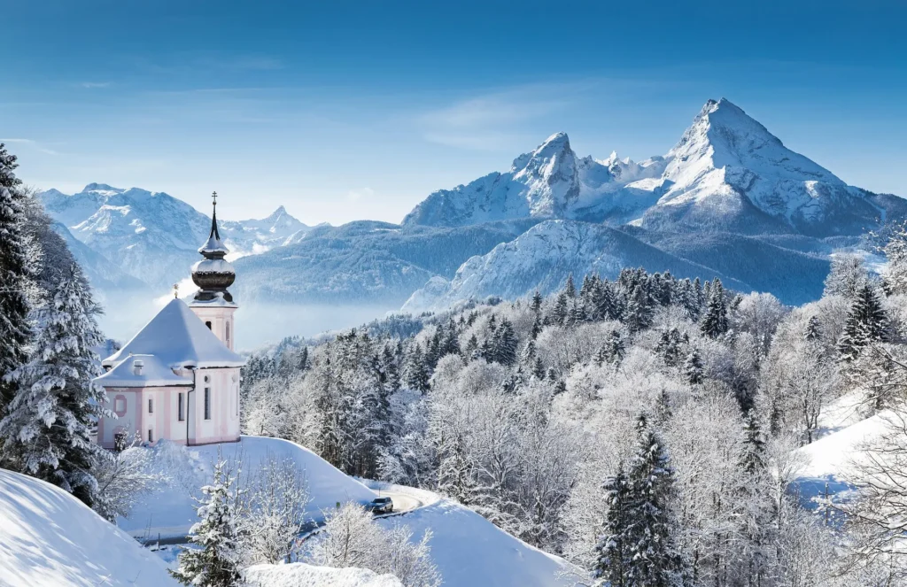 Snow-covered mountains in a winter landscape, ideal for February vacations in cold-weather destinations