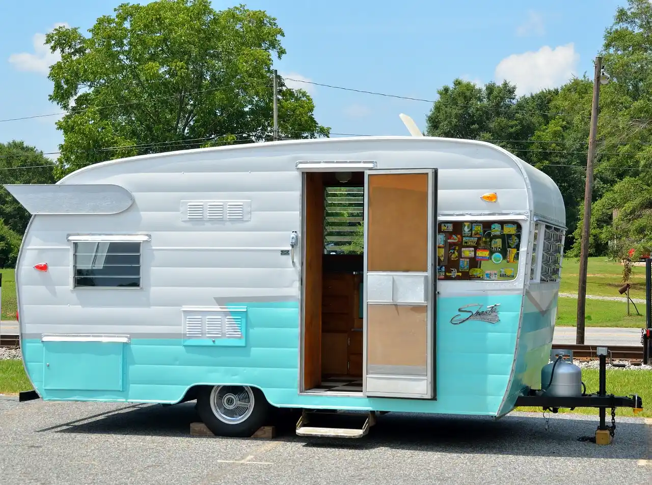 "Best travel trailers: Restored vintage camper showcasing classic design and modern amenities."