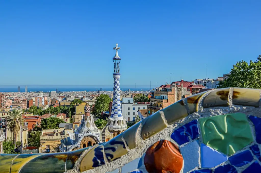 "Gaudí's Park Güell in Barcelona, showcasing colorful mosaics and unique architectural designs."

