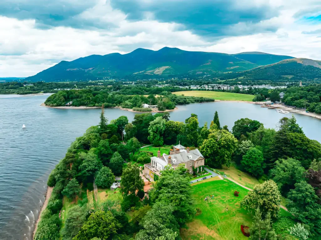 Derwent Water, Lake District, England – Aerial view of a stunning lake with islands at sunset, one of the top things to visit in England.