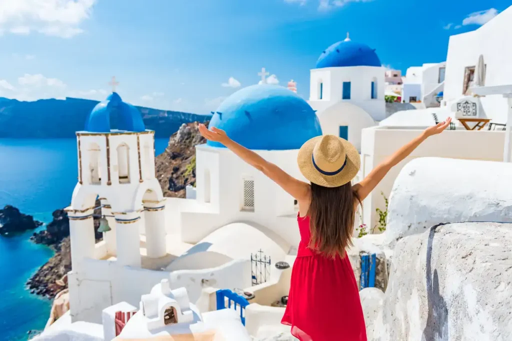 Travel tips for a beautiful summer destination in Santorini, Greece, showcasing scenic views and stunning beaches."