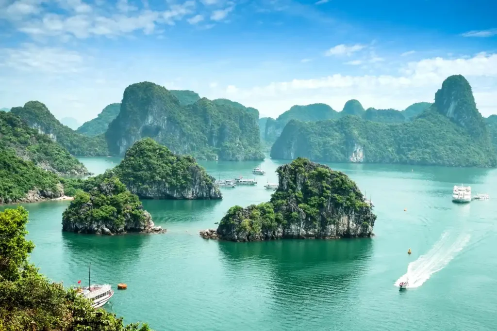 A breathtaking view of Halong Bay, Vietnam, featuring emerald waters and towering limestone islands, making it one of the cheapest places to visit in 2025 for budget travelers.

