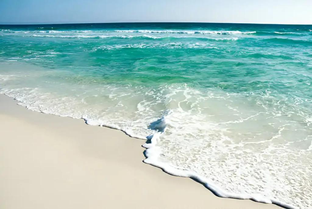 "Destin water temperature and clear ocean waves along the Florida coast."

