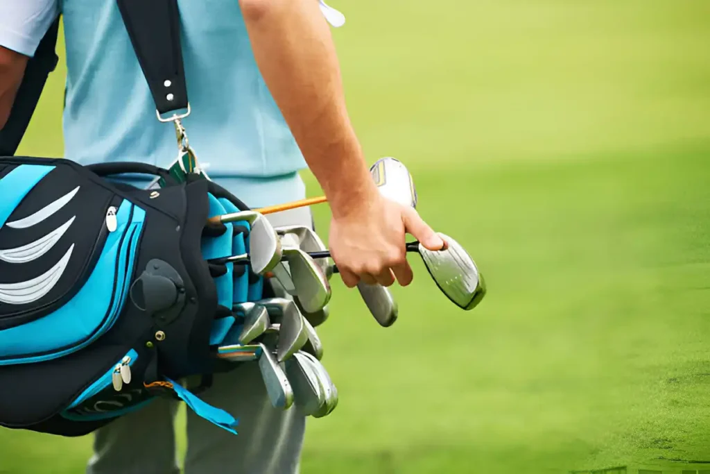 Man carrying the best golf travel bag while walking on a golf course.