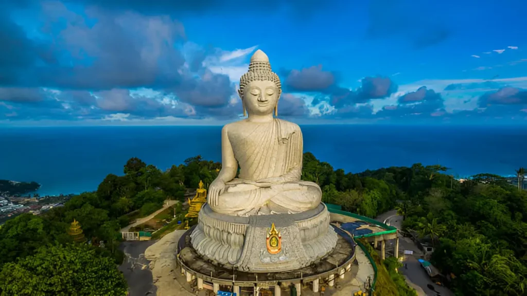 Aerial view of Phuket's Big Buddha statue against a clear blue sky.