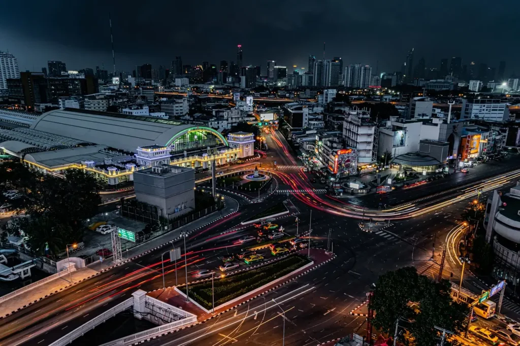 "Stunning night view of Bangkok city, showcasing vibrant lights and cityscape during travel Asia Thailand experience.