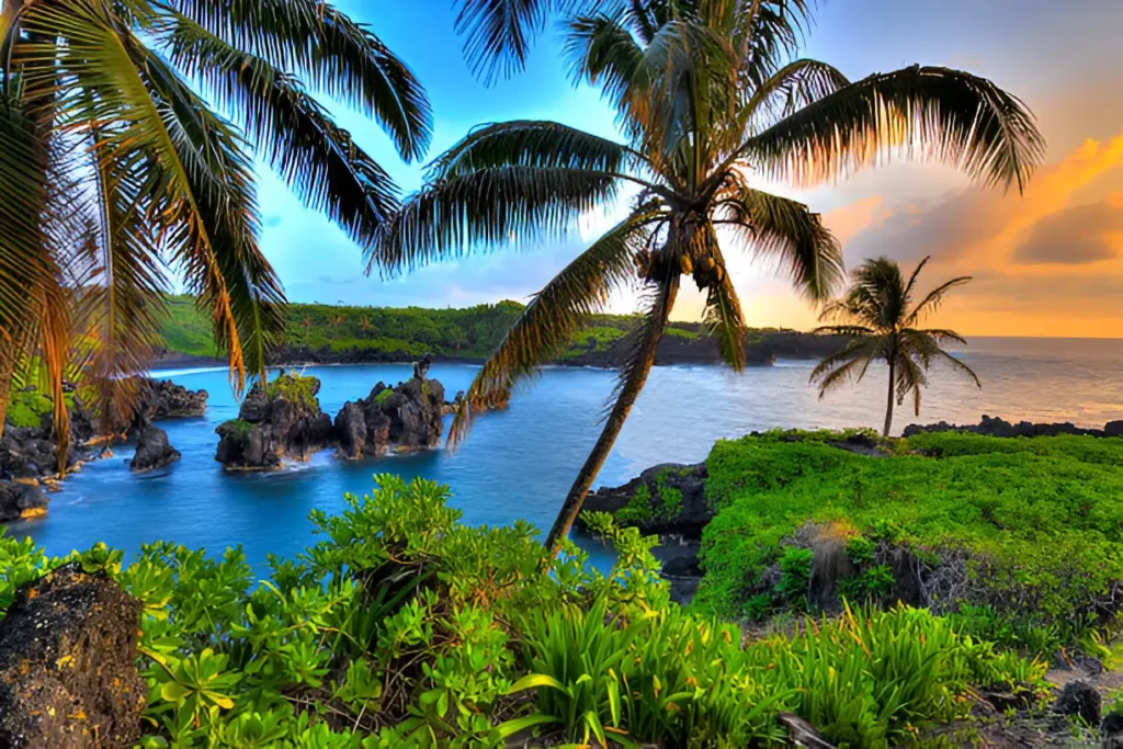  Maui, Hawai sunset beach view capturing one of the best places to travel in May USA with vibrant skies and tranquil ocean waves.