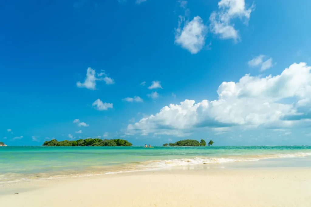 "Beautiful view of Chaweng Beach in Ko Samui Thailand with vibrant blue waters and golden sandy shores."